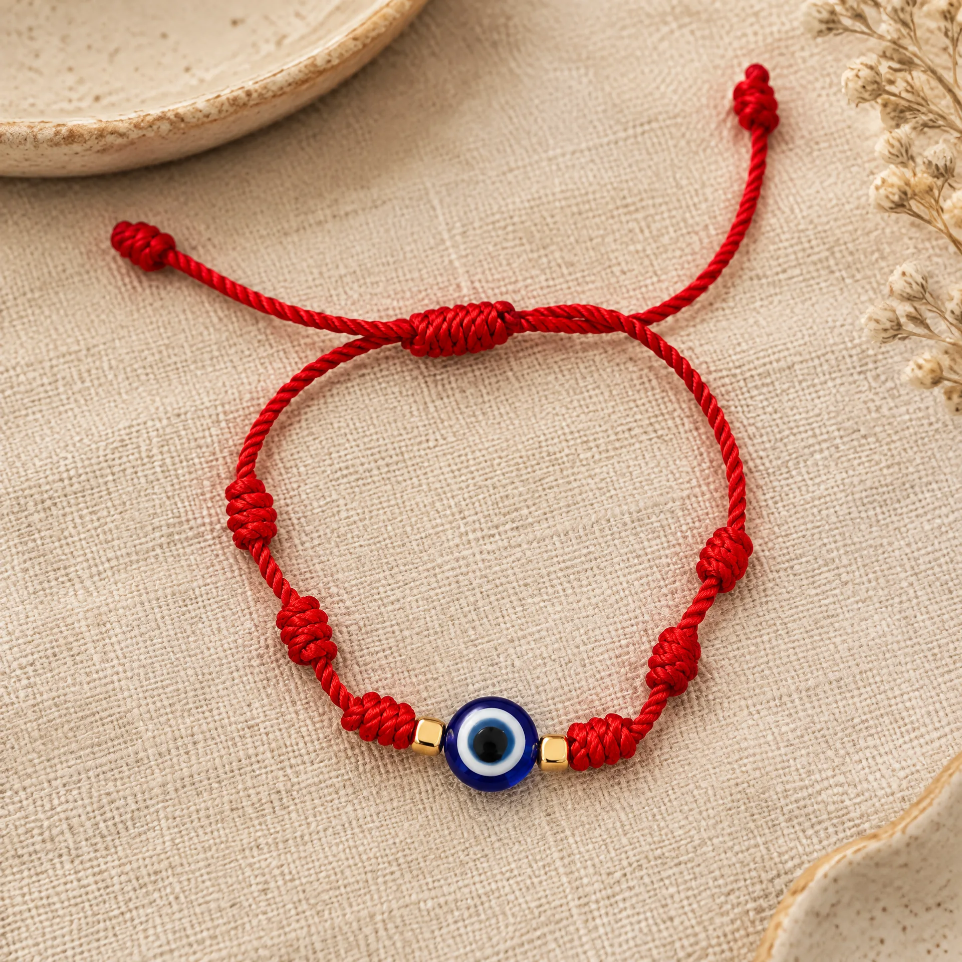 Pulseira dos 7 nós com olho turco em vermelho