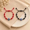 Pulseira dos 7 nós com olho turco em preto e vermelho