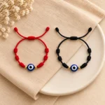 Pulseira dos 7 nós com olho turco em preto e vermelho